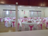 Wedding 'Duitse saal' Philippi, decorated guest tables, main table and back drop with fairy lights